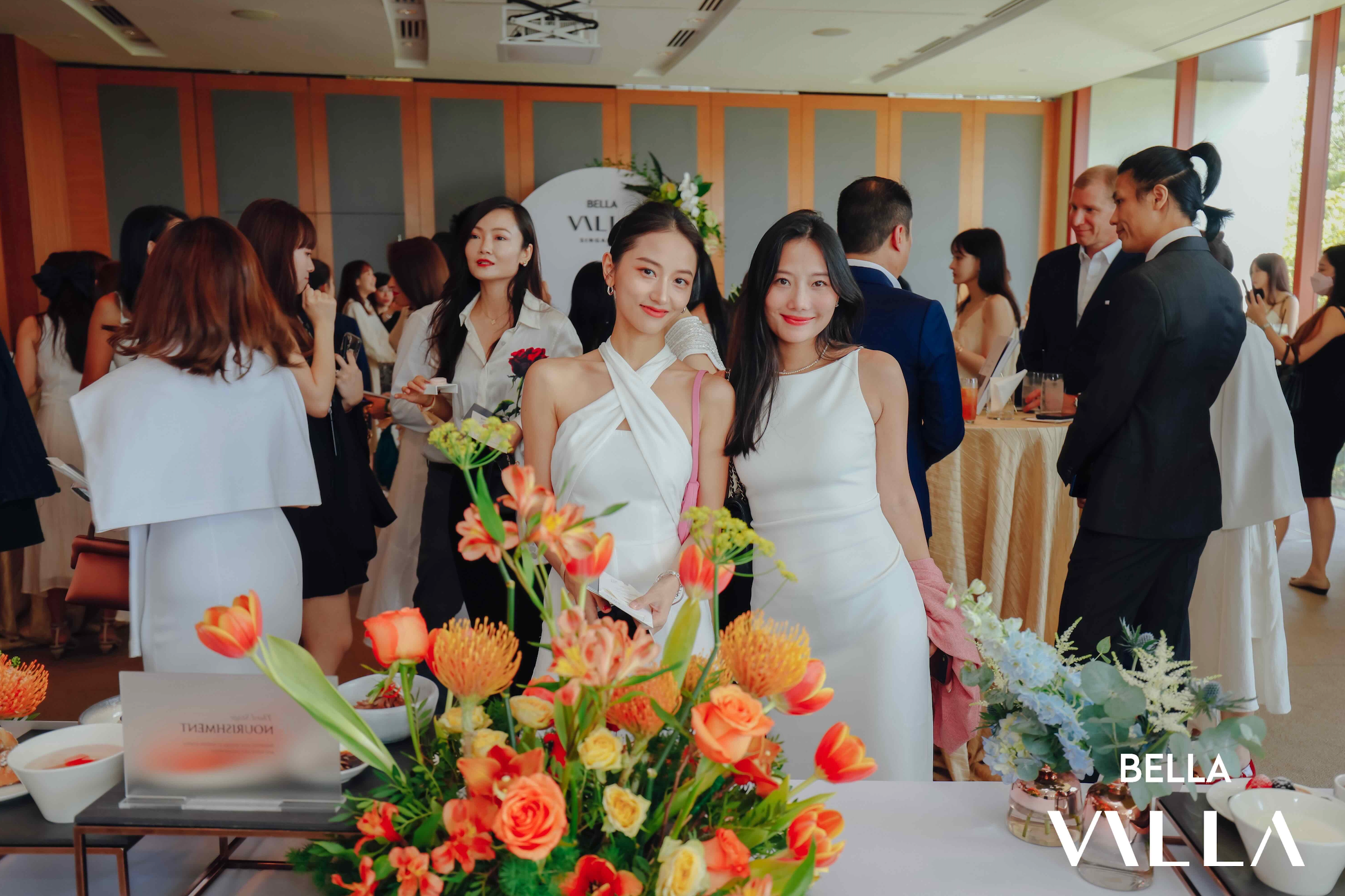 guests taking photos during an opening ceremony